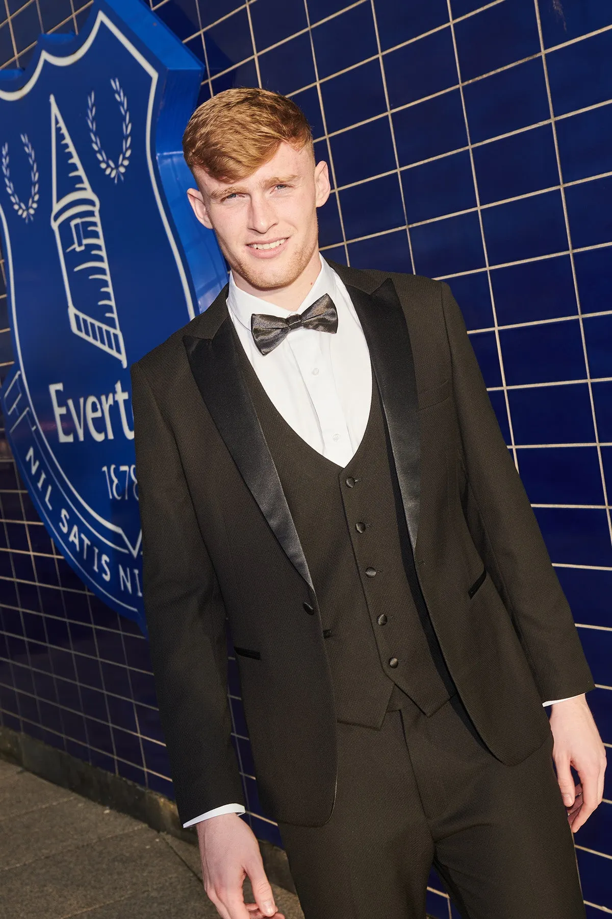 The Everton Collection | Jarrad Branthwaite in DALTON Black Tux Lapel Diamond Suit